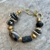Boho Chic Bracelet Black Lava Rock African Tribal Brass and Batik Bone Beads